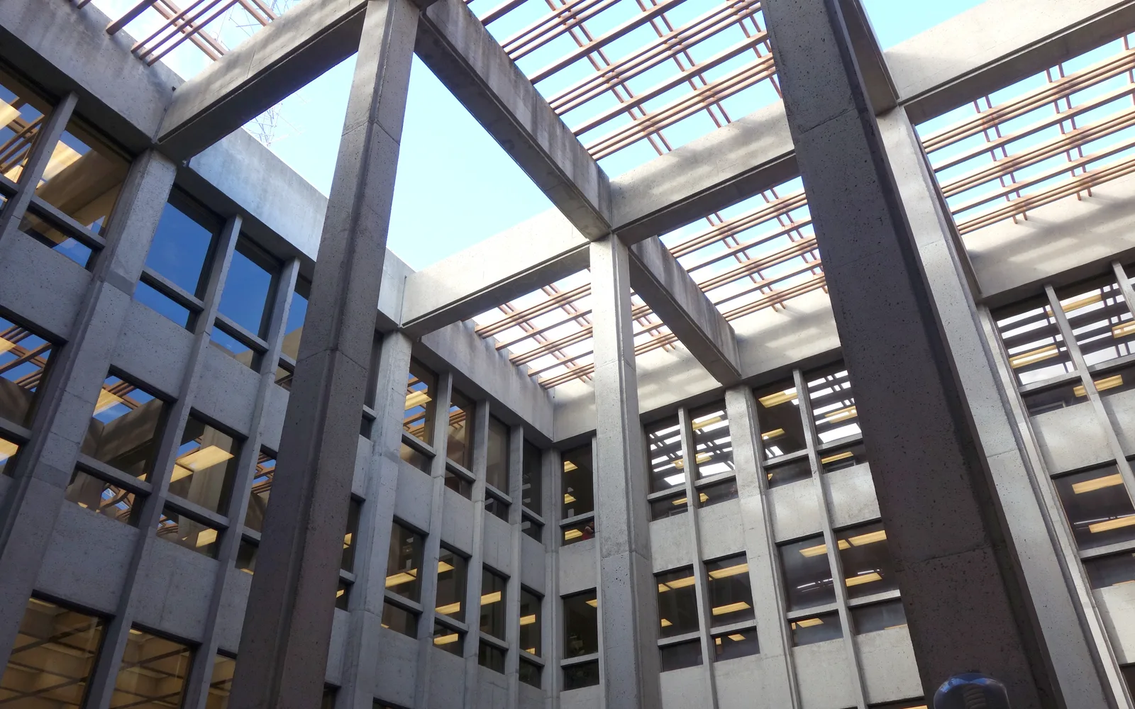 The modern brick facade of Meriam Library at California State University with glass windows and architectural details